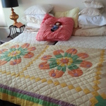 beautiful early quilt and 2 hospital beds