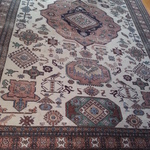 nice Persian rug with some wear