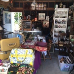 packed garage with costume jewelry & housewares