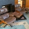 2 Taupe Eames Loungers with ottoman