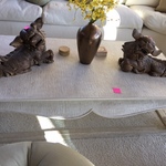 wood lions and coffee table