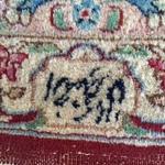 beautiful hand tied, signed rug